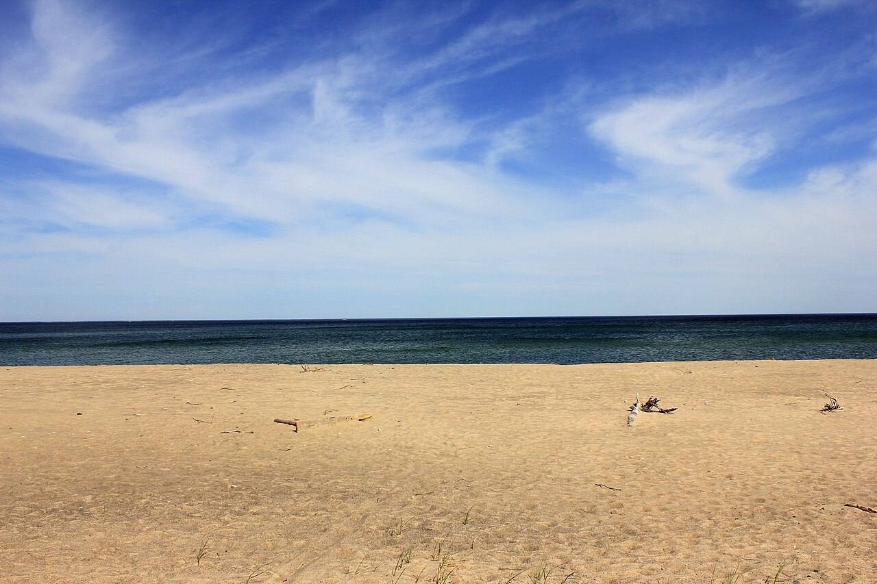 Free Public Domain Stock Photos of the Upper Peninsula(The UP) in Michigan with its shorelines, parks, and wilderness areas. Lake Superior shoreline to the Hori