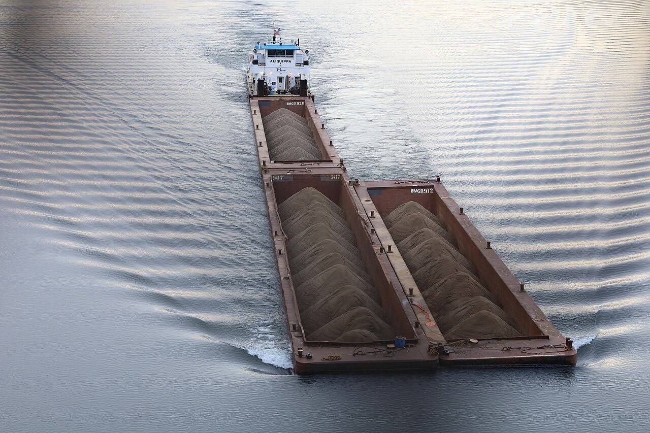 A barge in the Ohio River viewed from the Monaca-East Rochester Bridge in Beaver County, Pennsylvania in 2025